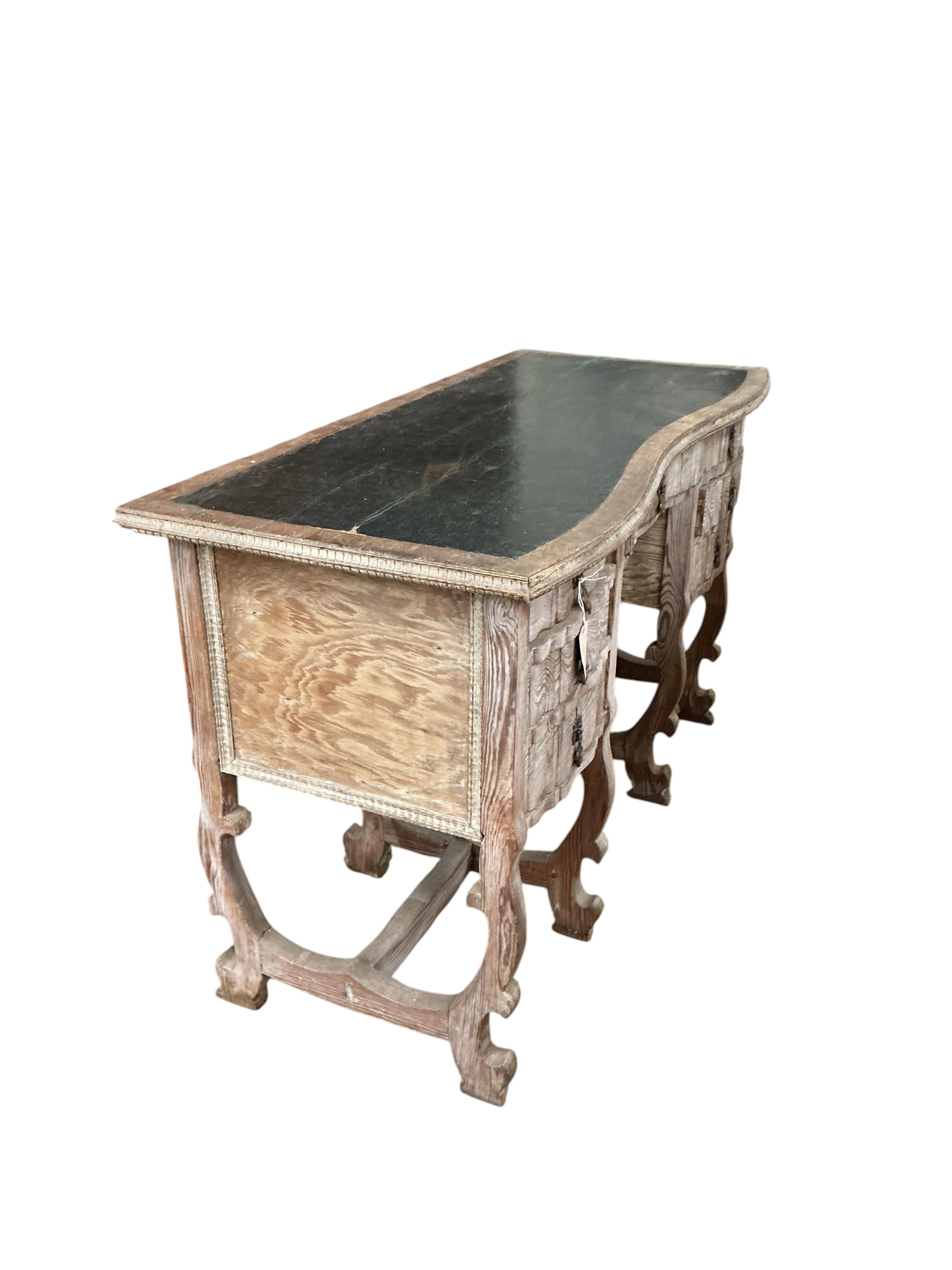 An early 20th century Continental bleached oak kneehole desk, width 122cm, depth 56cm, height 78cm